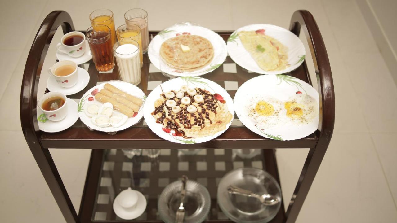 Four Squares Karachi Acomodação com café da manhã Exterior foto